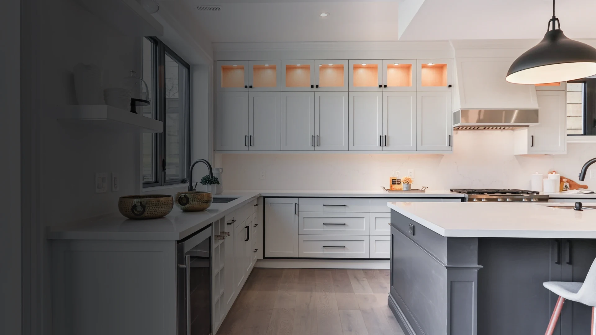 white kitchen with cabinets full